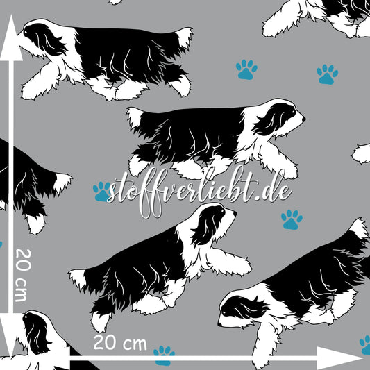Bearded Collies (Beardie) als schwarze Silhouetten auf grauem French Terry mit türkisfarbenen Pfoten – stoffverliebt.de