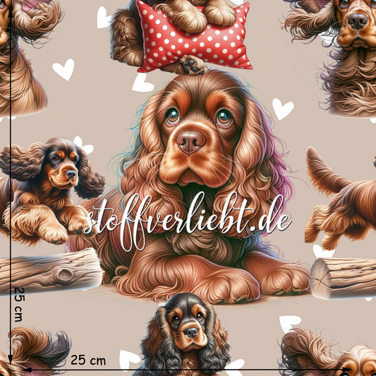 French Terry Stoff mit Cocker Spaniel Motiv und Herzchen auf beigem Hintergrund 